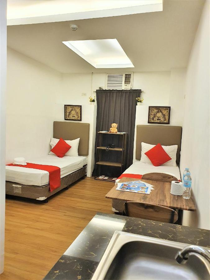 Spiral Suites Hotel Quezon City Bagian luar foto